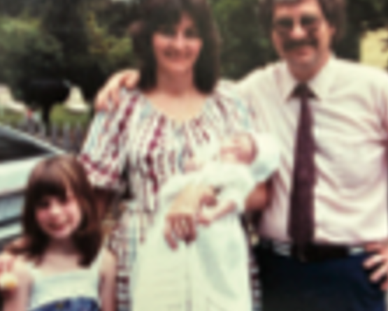 A young Christine Barber with her mother, father, and baby sibling