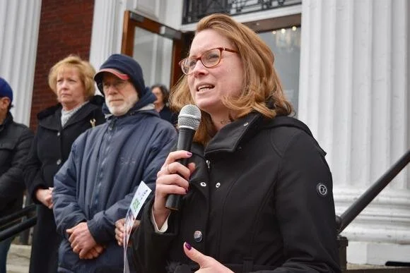 Christine Barber speaking at an outdoor rally